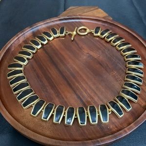 Black and gold tone toggle necklace